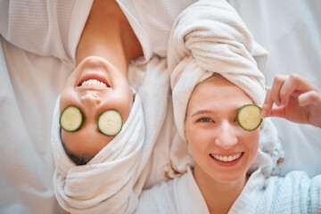 Friends, face and teenager, girl and facial, pampering and beauty, cucumber in portrait for...
