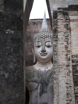Seated Buddha image (Phra Atchana) at Wat Si Chum temple in Sukhothai Historical Park, a UNESCO world heritage site, Thailand