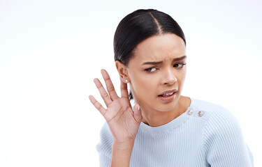 Listen, hear and woman with hand on ear on white background for news, information and gossip in studio. Listening mockup, sound and isolated girl with gesture for rumor, attention and communication