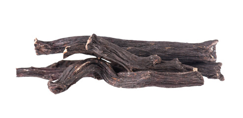 Common comfrey root isolated on white background. Dry roots of Symphytum officinale.