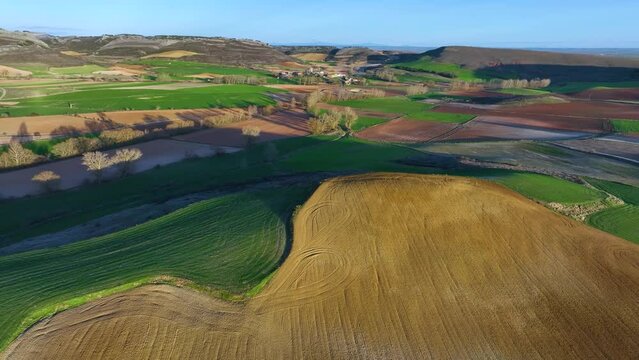 Agricultural landscape in the town of Amaya at the base of the hanging syncline of Peña Amaya. World geological heritage by UNESCO. Las Loras Geopark. Burgos. Castile and Leon. Spain, Europe