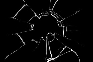 Concept of broken glass with hole for design on black background.