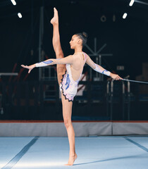 Ribbon, gymnastics and flexible woman in dance performance, balance legs and sports competition....
