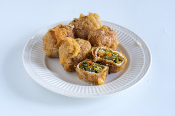 tahu isi , deep fried tofu filled vegetables
