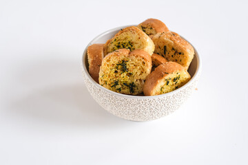 crispy garlic bread in bowl

