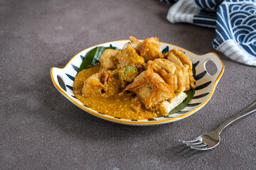 batagor is astreet food very popular in Indonesia, is one of the local food served with fish cake, tofu and peanut sauce