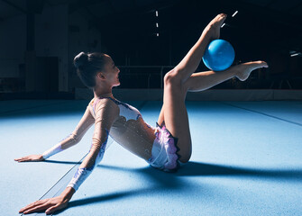 Woman, gymnastics and legs with ball for dancer performance, competition training or dark sports...