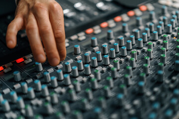Sound engineer used digital audio mixer Sliders Engineer presses keys Control panel Recording...
