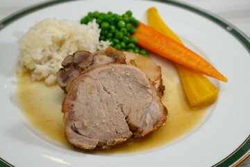 Roast Veal with Kidney or Kalbsbraten in the Style of Austria with Rice, Peas and Gravy