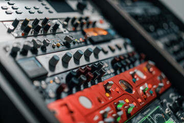 old displays of professional analog vu meters in a recording studio measuring and showing decibels