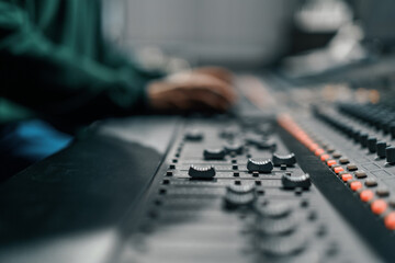 Sound engineer used digital audio mixer Sliders Engineer presses keys Control panel Recording...