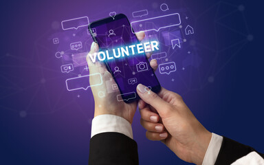 Hand using smartphone with social media concept