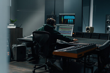 Sound engineer used digital audio mixer Sliders Engineer presses keys Control panel Recording...