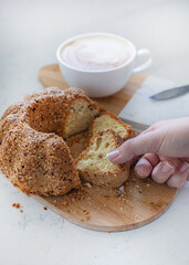 Food photography of cupcake, cake with raisins, nuts, cappuccino, coffee, baking, dessert.