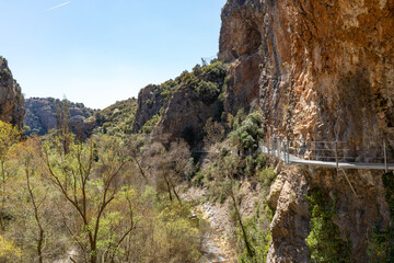 Footbridges of Alquezar on a sunny day on the Vero river, located several meters high, allow you to enjoy this part of the river.