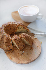 Food photography of cupcake, cake with raisins, nuts, cappuccino, coffee, baking, dessert.