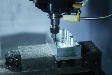 CNC Mechanical and technology industry 4.0. The process of turning with a cutting and milling tool the outer surface detail of the metalworking parts.