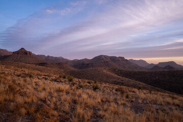 Sunset in desert mountains on the border