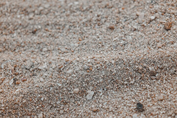 Sand , closeup of sand pattern of a beach in the summer