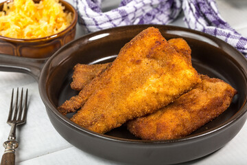 Pieces of cod in breadcrumbs.