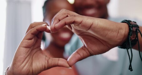 Couple, heart and hands in home of love, date and commitment of happy partner together. Closeup man, woman and finger shape of care in relationship, support or trust of hope, solidarity or emoji sign