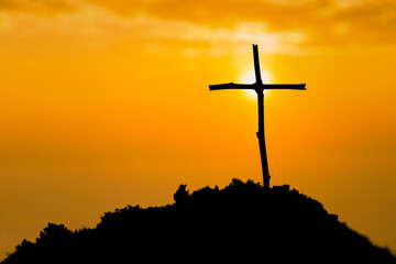 Crucifixion Of Jesus Christ - Cross At Sunset. The concept of the resurrection of Jesus in...
