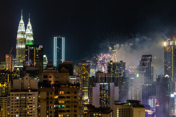 Fototapeta na wymiar Fireworks on New Year's Eve in Kuala Lumpur, Malaysia 