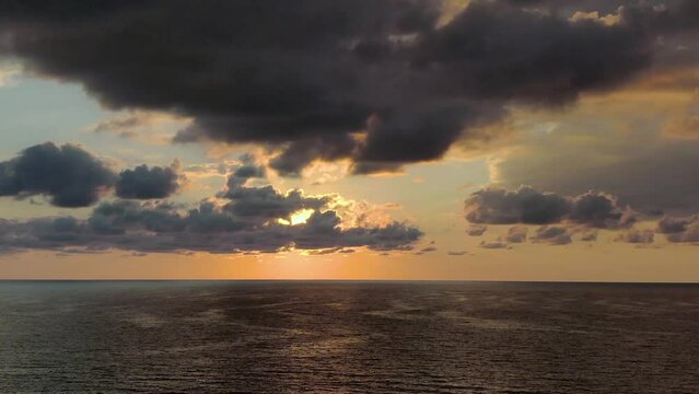 Beautiful calm sunset with clouds on the sea, Batumi,Georgia 