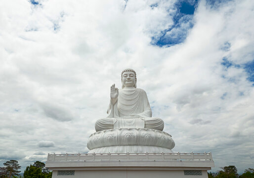 Sitting white great Budda statue, aerial photography.