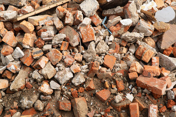 A pile of broken red bricks