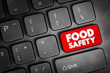 Food Safety text button on keyboard, concept background