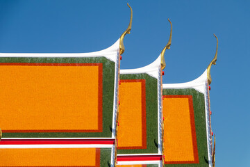 Details of the orange roof of the Royal Palace in Bangkok, Thailand