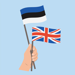 Flags of Estonia and UK, Hand Holding flags