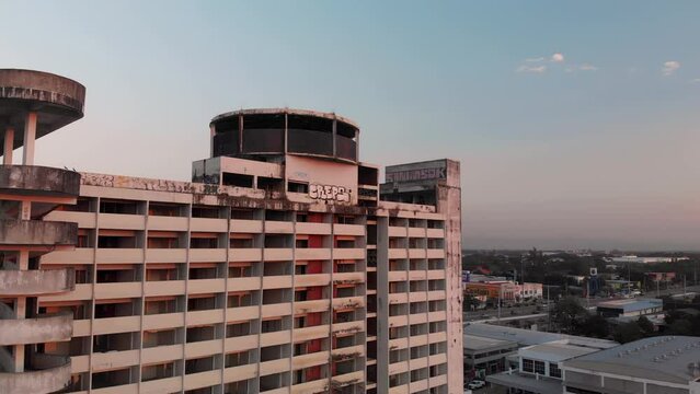 Drone view of an abandoned hotel close to highway in Chiang Mai, Lampang Road