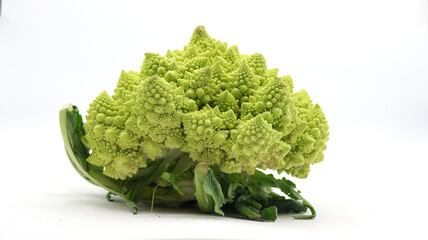 close up close up of a Roman broccoli on a white background