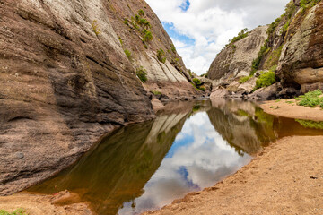 Geological formations, river and vegetation