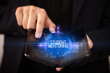 Young man holding a foldable smartphone