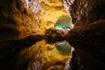 Cueva de los Verdes, Water optical illusion reflection, an amazing lava tube and tourist attraction on Lanzarote, Canary Island, Spain.