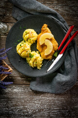 Breaded chicken breast fillet.