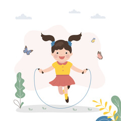 Pretty little girl jumping rope. girl wearing fairy costume. Happy caucasian child training and doing exercise. Childhood, summer activity, kids games.