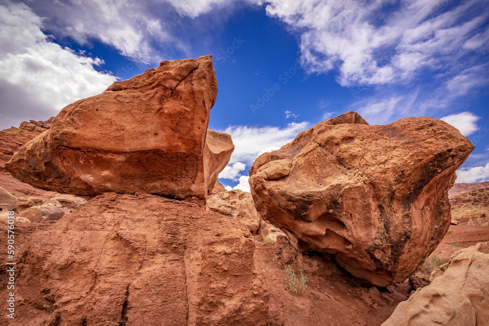 Wall mural gathering storm over large boulders at the vermilion cliffs in northern arizona