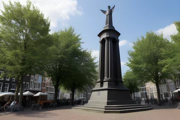 Deurstickers The monument to the Dutch lawyer Hugo Grotius (Hugo de Groot) installed in 1886 on the market square in the Dutch city of Delft. Delft, the ... See More © Floor