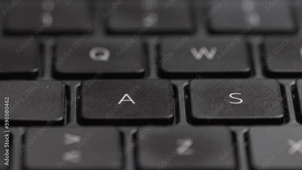 Poster keyboard laptop black, pressing key letters on personal computer. macro detail keyboard and technolo