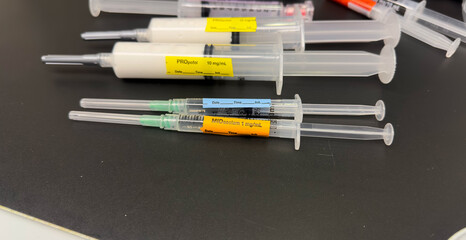 hospital drugs in syringes, including propofol, represents the importance of medicine in healthcare. It symbolizes the role of doctors and nurses in administering drugs to alleviate pain
