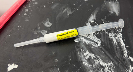 hospital drugs in syringes, including propofol, represents the importance of medicine in...