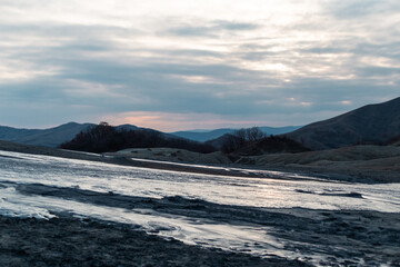 Obraz premium landscape with mountains and mud volcano