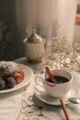morning cup of coffee with croissant 