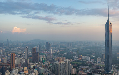 Fototapeta na wymiar Kuala Lumpur City view with Warisan Merdeka Tower view at sunset time