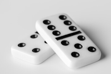 simple classic domino tiles in white on a light background