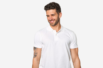 Fototapeta premium Young handsome man isolated laughs and closes eyes, feels relaxed and happy.